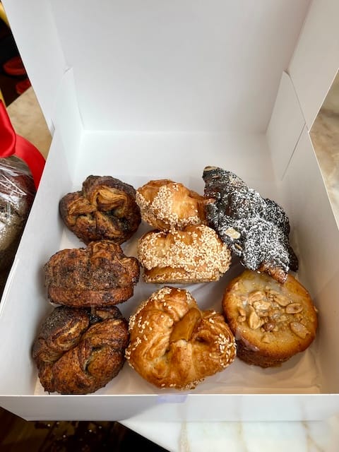 Picture of a box of pastries on a table