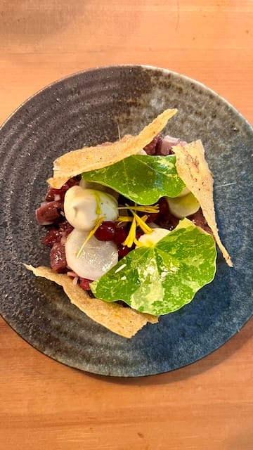 Photo of a plate of tartare and chips