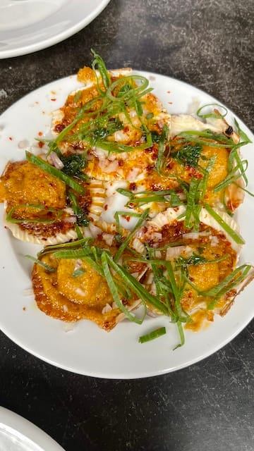 Photo of a plate of scallops