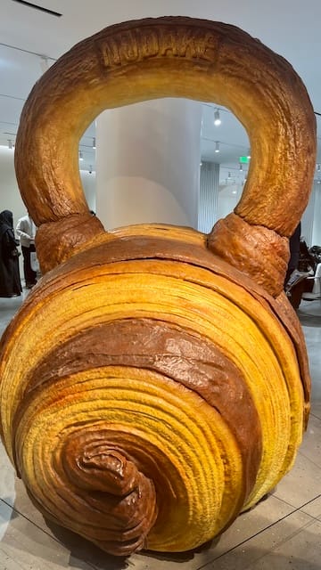 A picture of a giant croissant kettle bell